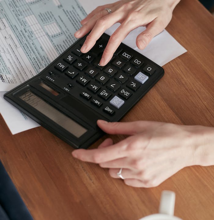 Person Holding Black Laptop Computer